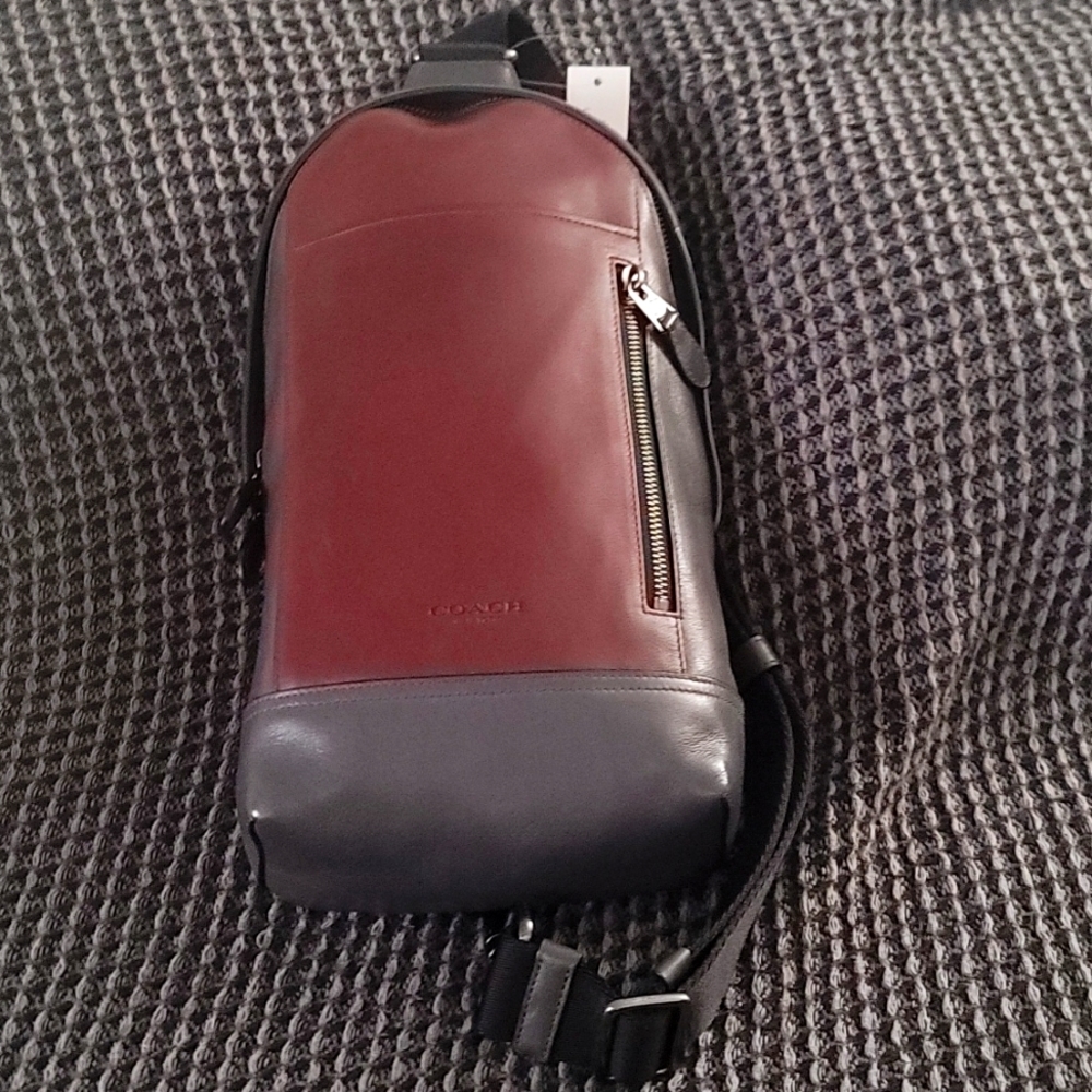 Coach sling backpack